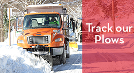 Snowplow with text reading Track Our Plows